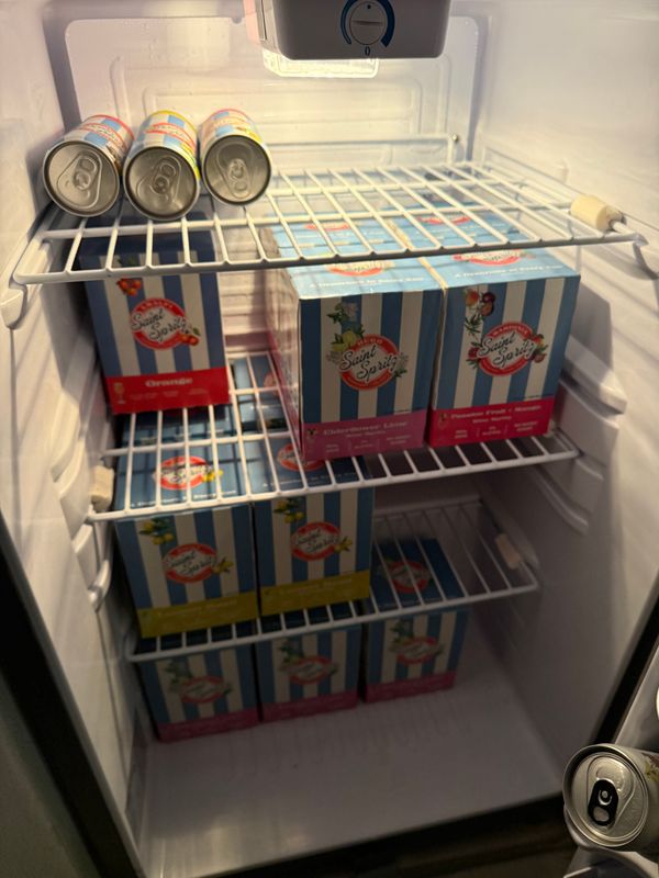 Pool refrigerator stocked with Saint Spritz